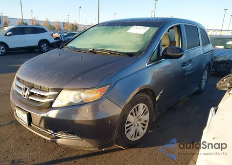 2014 Honda Odyssey Lx z USA, uszkodzony, nr VIN 5FNRL5H26EB047155